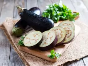 Sliced Eggplant On Wooden