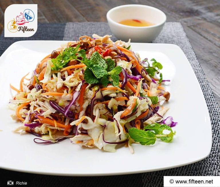 Salad To A Serving Plate